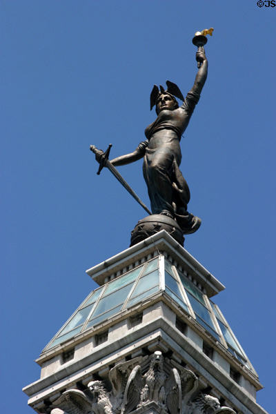 Woman with torch & sword atop Civil & Spanish-American War Memorial. Indianapolis, IN.