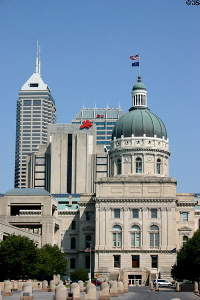 State Capitol in front of Bank One Tower with its two spires & Market Tower with key. Indianapolis, IN.