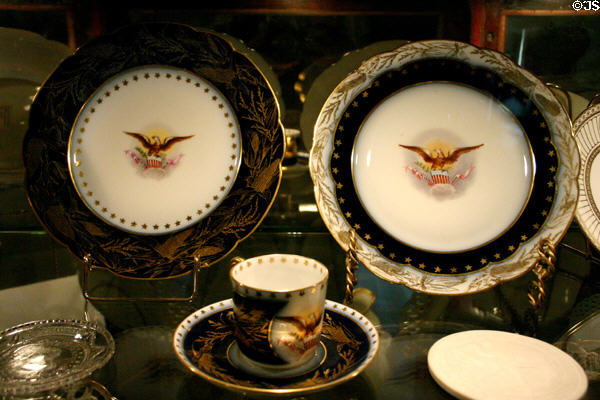 Dinner plates from Benjamin Harrison's White House Haviland porcelain with corn stalk border at Benjamin Harrison Presidential Site. Indianapolis, IN.