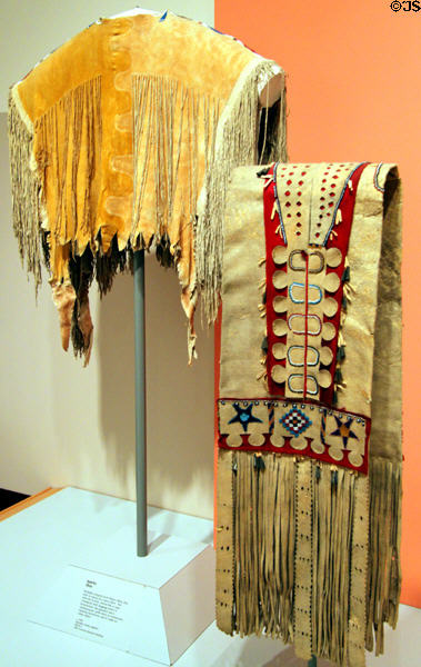 Apache man's deerskin shirt (c1920) & leather double saddle bags (c1900) at Eiteljorg Museum. Indianapolis, IN.