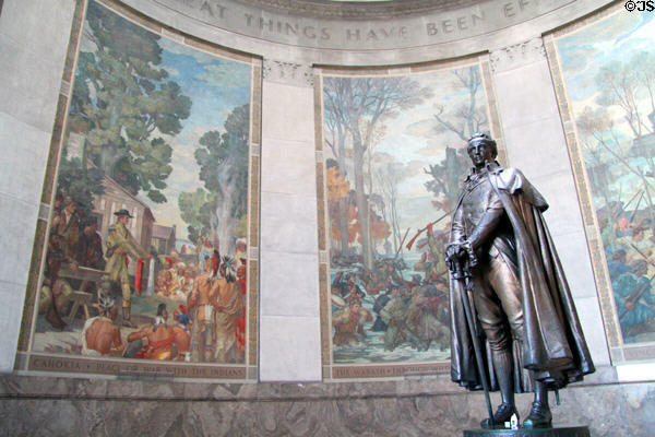 Statue of George Rogers Clark ringed by murals depicting his Revolutionary War campaign to wrest control of American West from the British. Vincennes, IN.