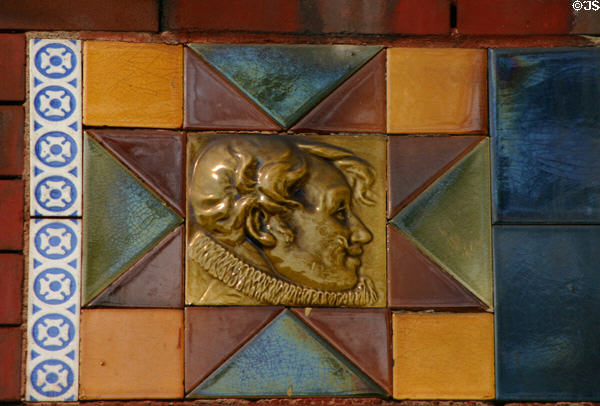 Arts & Crafts movement tile of man with lace collar (515 Russell St.). Covington, KY.