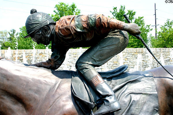 Bronze jockey urges mount on at Thoroughbred Park. Lexington, KY.