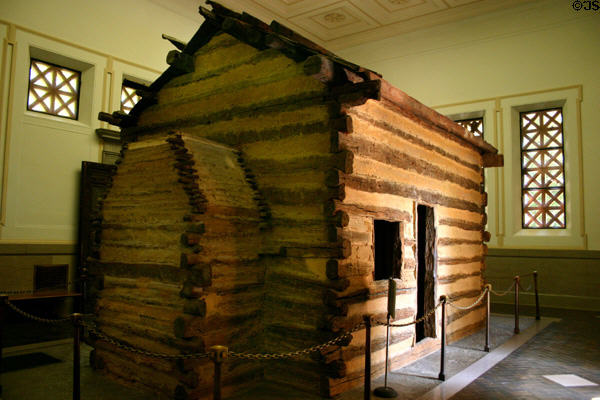 Abraham Lincoln log cabin birthplace with wooden chimney. Hodgenville, KY.