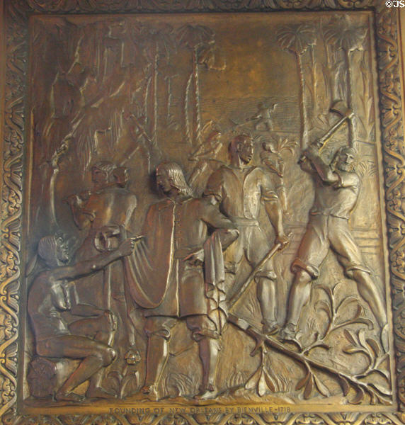 Founding of New Orleans by Bienville (1718) bronze door panel in Louisiana State Capitol. Baton Rouge, LA.