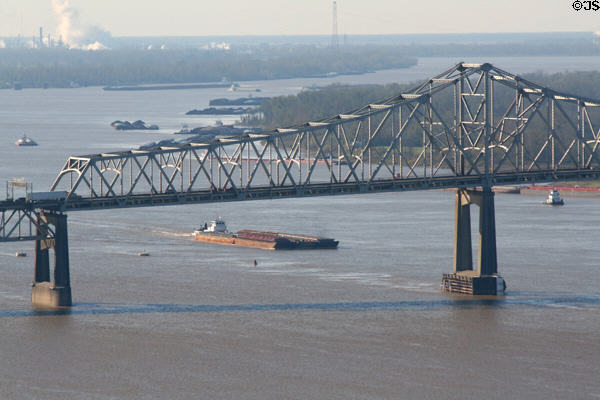 Barge under Interstate Highway 10 bridge on Mississippi River. Baton Rouge, LA.