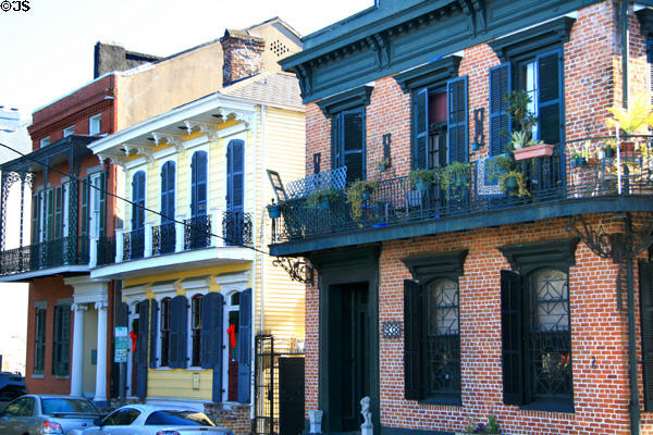 Brick & yellow streetscape of (936 & 938 Esplanade Ave.). New Orleans, LA.