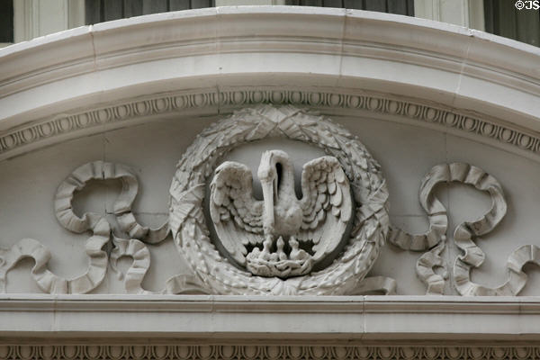 Carving of pelican feeding young over door of International House Hotel. New Orleans, LA.