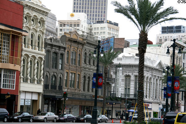 Heritage buildings along Canal Street at St. Charles. New Orleans, LA.
