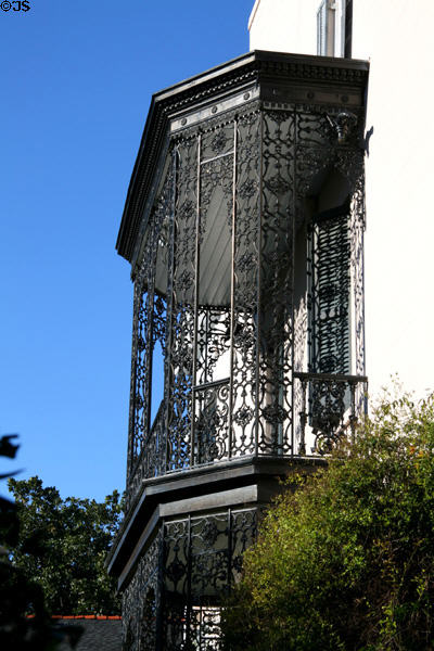 Side cast iron balcony of Payne House died in Garden District. New Orleans, LA.