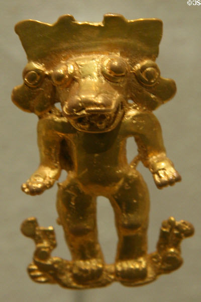 Gold pendant of animal with three heads (700-1400) from Guanecoste Region of Costa Rica at New Orleans Museum of Art. New Orleans, LA.