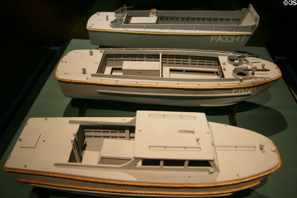 Models of landing craft made in New Orleans during WWII at National World War II Museum: (f-b) Eureka Work Boat (1930s), LCP (L) & LCVP. New Orleans, LA.