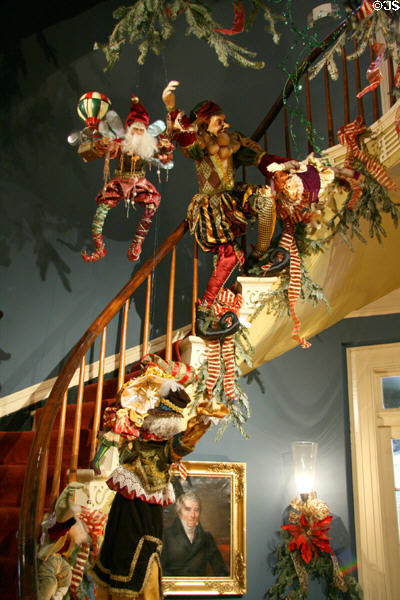 Christmas puppets on cantilevered spiral staircase at Houmas House. Burnside, LA.