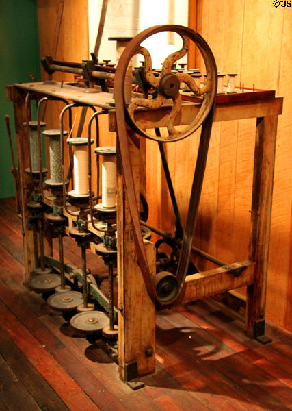 Early bobbin winding machine at Boott Cotton Mills. Lowell, MA.