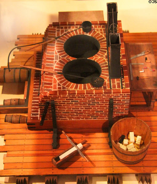 Model of try-works kettles used to render whale blubber aboard whaling ships at New Bedford Whaling Museum. New Bedford, MA.