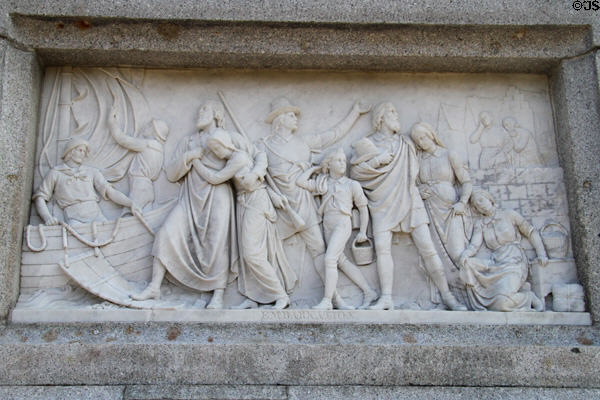 Relief carving of Pilgrims' embarkation from Europe on National Forefathers Monument. Plymouth, MA.