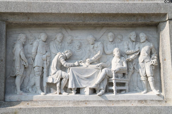 Relief carving of Pilgrims' Mayflower Compact on National Forefathers Monument. Plymouth, MA.