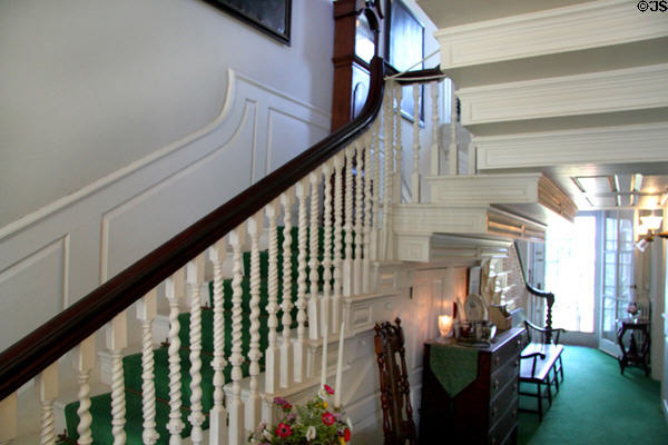 Central hallway of Mayflower Society House with stairs to front & back of house. Plymouth, MA.