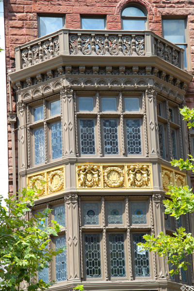 Stone bay window of Commercial heritage building (1886) (647 Boylston St.). Boston, MA.