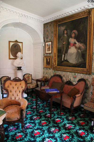 Parlor settees with portrait (1781-5) of Grandchildren of Sir William Pepperell by Mather Brown at Longfellow National Historic Site. Cambridge, MA.