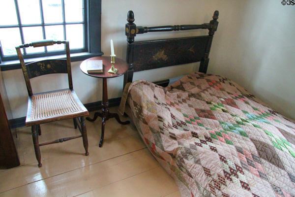 Bedroom with quilted bed at House of Seven Gables. Salem, MA.