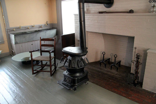 Fireplace & iron stove in washing/ironing room at Peacefield. Quincy, MA.
