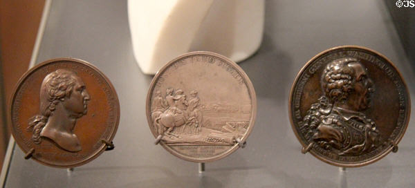 Collection of memorial medals (1776-1830) including bust of George Washington at Museum of Fine Arts. Boston, MA.