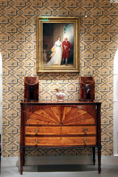 Sideboard (c1808) by William Hook of Salem, MA with pair of knife boxes (c1790-99) from Philadelphia, PA under portrait of Mr. & Mrs. Thomas Russell (1793) by John Trumbull at Museum of Fine Arts. Boston, MA.