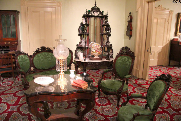 Parlor (c1840) from Roswell Gleason House of Dorchester, MA with sofa & chairs (c1850-70) & center table (c1849) plus Étagère (1861-5) by George Croome of Boston, MA at Museum of Fine Arts. Boston, MA.