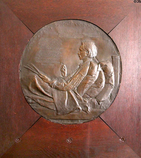 Bronze sculpted plaque of Robert Louis Stevenson (1888) by Augustus Saint-Gaudens, uncle of Rose Nichols, at Nichols House Museum. Boston, MA.