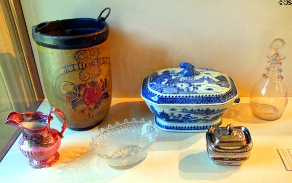 Thoreau family objects including Staffordshire lusterware pitcher (1840-50), fire bucket (c1825), glass sweetmeat dish (1790-1810), Chinese export porcelain covered tureen (c1790), Staffordshire lusterware covered sugar bowl (1840-50), & English glass decanter (c1820) at Concord Museum. Concord, MA.