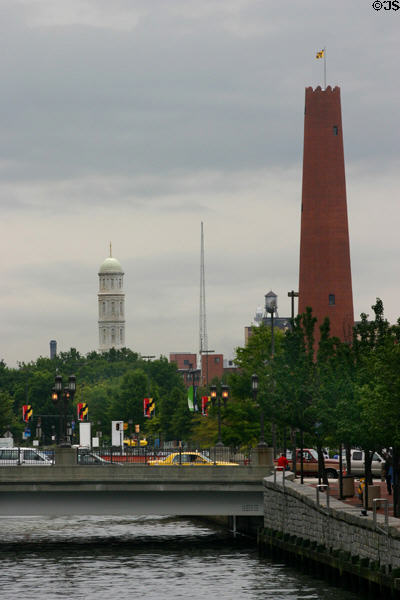 View of St. Vincent De Paul Church Tower (1841) & red Phoenix Shot Tower (1828) where shot was made from falling molten lead. Baltimore, MD.