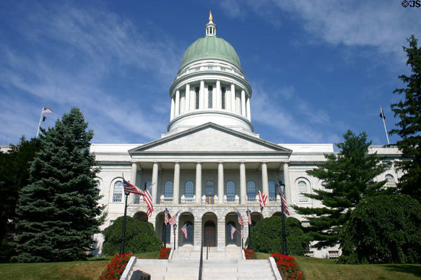 Maine State Capitol of Hallowell granite with central section (1829) & wings added in 1911. Augusta, ME. Architect: G. Henri Desmond.