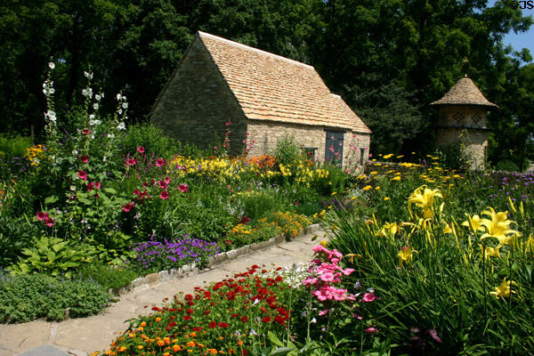 Flower display of Cotswold Cottage at Greenfield Village. Dearborn, MI.