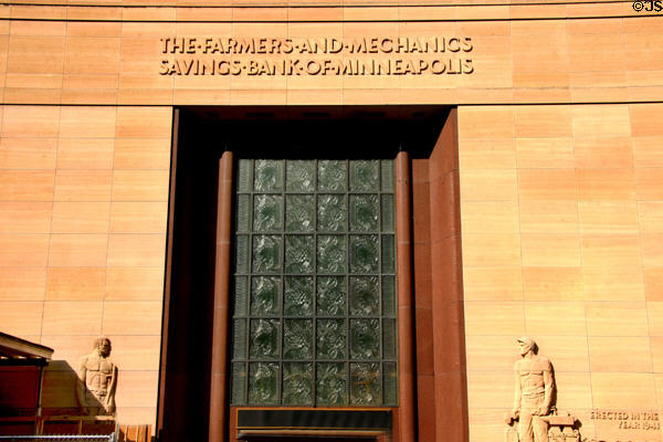 Farmer's and Mechanic's Savings Bank of Minneapolis (1941) (88 South 6th St.) (stone reliefs by Warren T. Moseman) now an entrance for Westin Minneapolis. Minneapolis, MN.