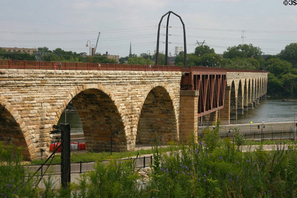 Stone Arch Bridge across Mississippi River. Minneapolis, MN.