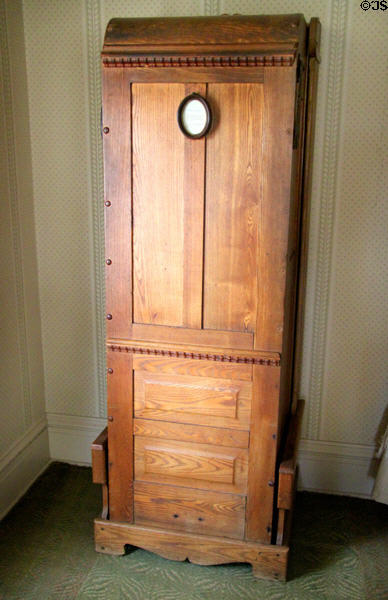 Confessional booth-style portable bathtub in closed position (late Victorian) by Sears, Roebuck at Chatillon-DeMenil Mansion. St. Louis, MO.