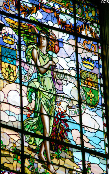 Winged figure proclaiming morality, quality, temperance on Missouri values stained glass window at Missouri State Capitol. Jefferson City, MO.