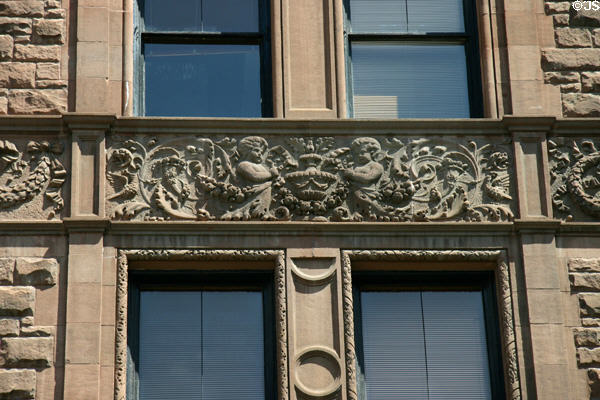 Carving details on brownstone building (9th at Wyandotte Sts.). Kansas City, MO.