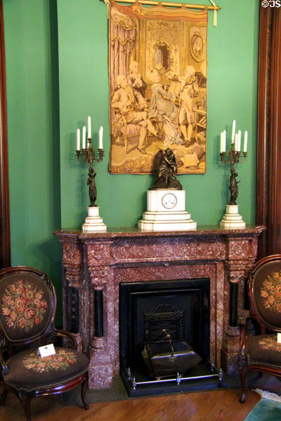 Parlor fireplace with mantle clock bronze candelabras at Vaile Mansion. Independence, MO.