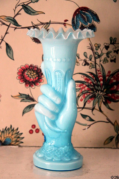 Glass hand holding vase at John Wornall House Museum. Kansas City, MO.