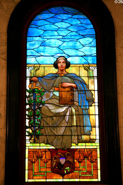 Stained glass window of woman with sword on stairwell of Mississippi State Capitol. Jackson, MS.