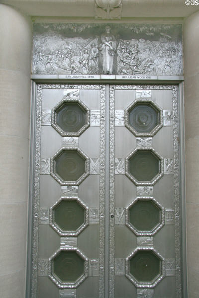Cast aluminum doors with scenes from Battles of San Juan Hill 1898 & Belleau Woods 1918 at War Memorial Building. Jackson, MS. Style: Art Deco.