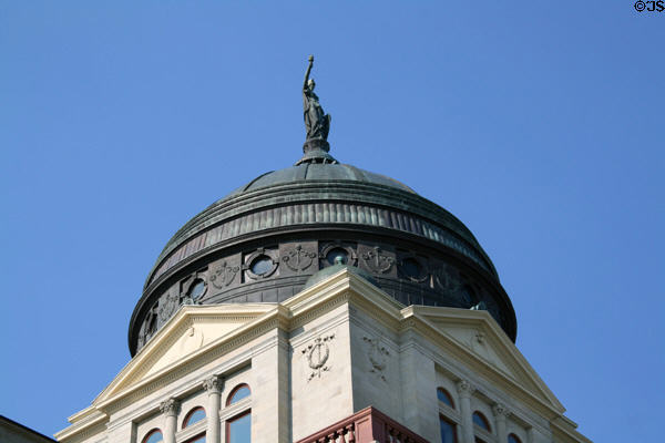 Dome of Montana State Capitol with Montana liberty statue. Helena, MT.