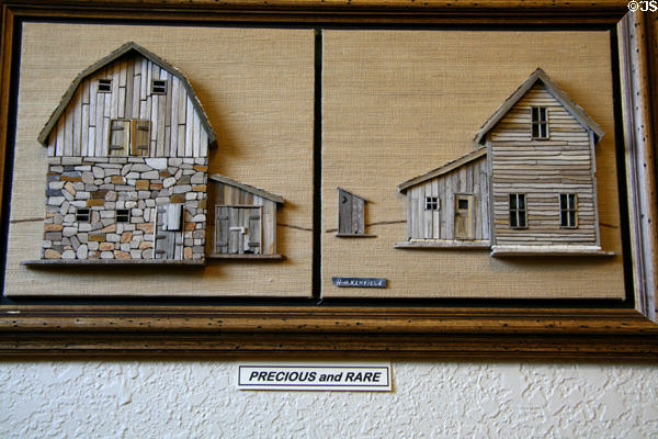 Sculpted barn & farmhouse by H.H. Kenfield in Petrified Wood Gallery. Ogallala, NE.