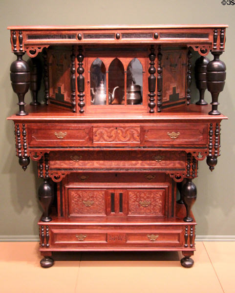 Cupboard of stacked boxes with applied moldings (1685-90) from Newbury area, MA at Currier Museum of Art. Manchester, NH.