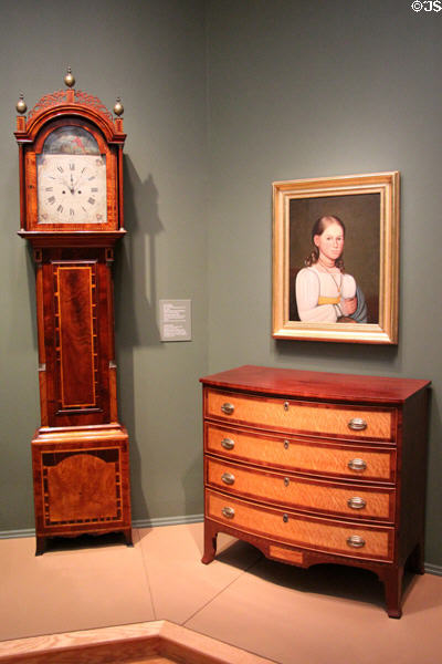 Tall clock (c1810) by Levi Hutchins, portrait of Sarah Minot Melville (c1830) by Zedekiah Belknap, & chest of drawers (c1813) by Joseph Clark of NH at Currier Museum of Art. Manchester, NH.