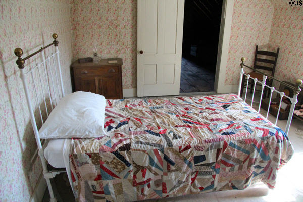 Bed with quilt at Robert Frost Farm. Derry, NH.