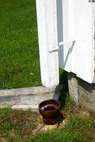 Square Shaker downspout on school house at Canterbury Shaker Village. NH.