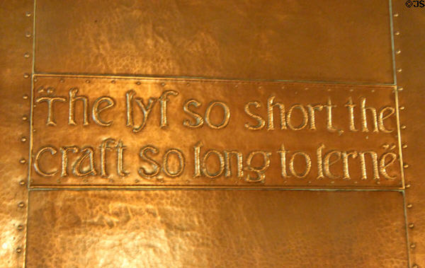Living room fireplace copper repousse slogan 'The lyf so short, the craft so long to lerne' at Craftsman Farms. Morris Plains, NJ.